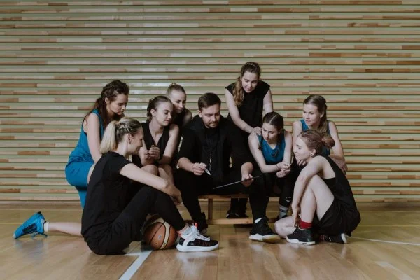 basketball coach team huddle